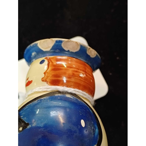 640 - A Clarice Cliff United Services pepper pot. Bizarre Newport Pottery marks together with another Unit... 