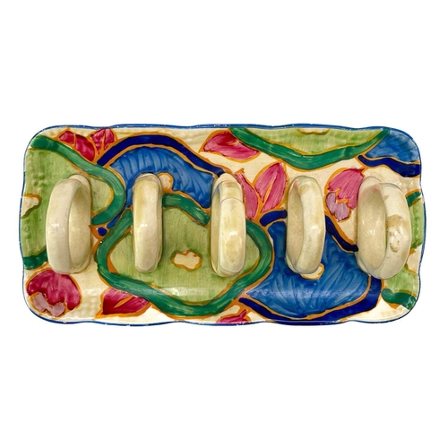 641 - A Clarice Cliff Blue Chintz pattern toast rack. Fantasque Bizarre Newport Pottery marks. Scratches t... 