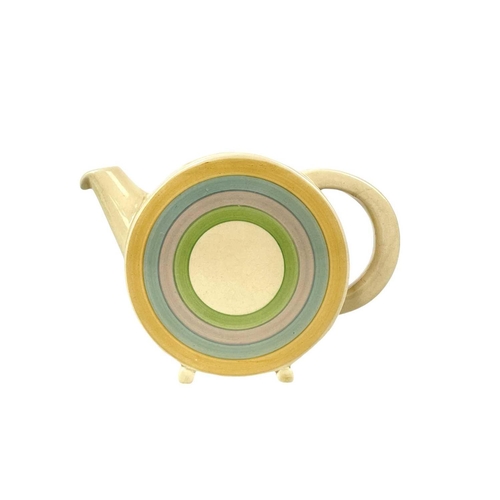 647 - A Clarice Cliff Bon Jour shape teapot and cover. Wilkinson Ltd marks, height 13cm together an Odilon... 