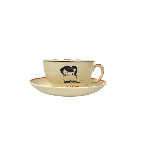 659 - A Rare Susie Cooper left hand Moustache cup and saucer. Susie Cooper Production Burslem marks togeth... 