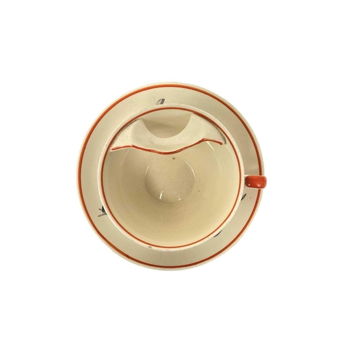 659 - A Rare Susie Cooper left hand Moustache cup and saucer. Susie Cooper Production Burslem marks togeth... 