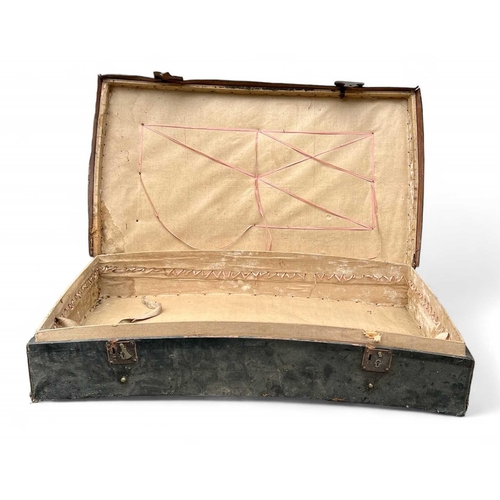 67 - An early to mid-19th-century trunk in leather-covered wood 121x69cm and 25cm deep. The base concave.