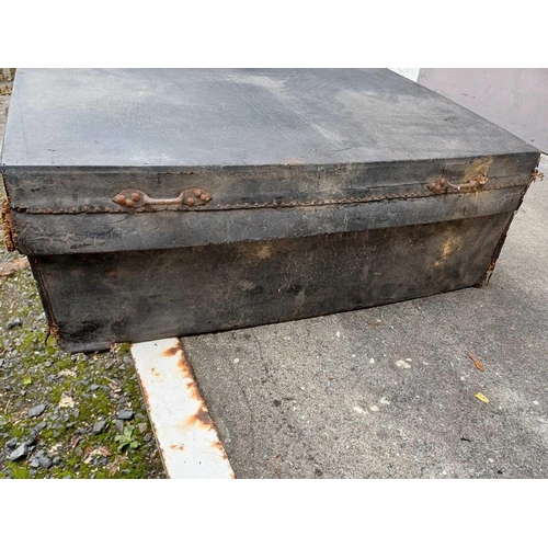 67 - An early to mid-19th-century trunk in leather-covered wood 121x69cm and 25cm deep. The base concave.