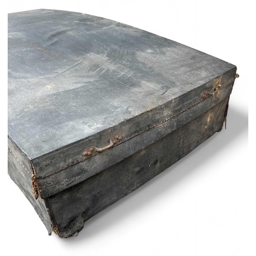 67 - An early to mid-19th-century trunk in leather-covered wood 121x69cm and 25cm deep. The base concave.