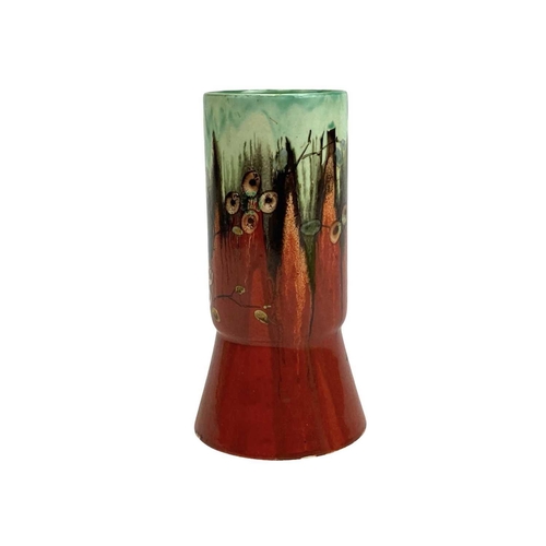 689 - A Clarice Cliff 703/5 shape vase with Delecia type decoration. Newport Pottery marks, height 13cm.