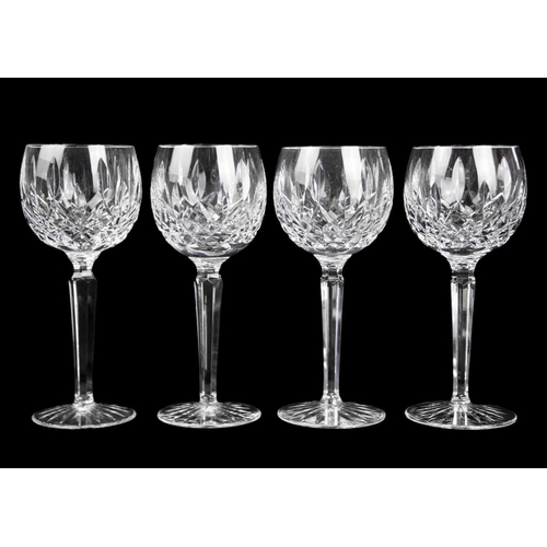 695 - A Waterford Crystal part suite. Lismore pattern comprising: six hock, five claret, five champagne fl... 