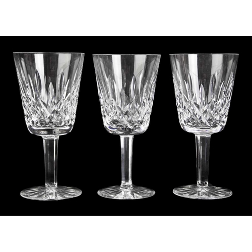 695 - A Waterford Crystal part suite. Lismore pattern comprising: six hock, five claret, five champagne fl... 