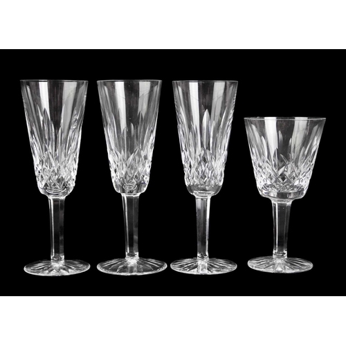 695 - A Waterford Crystal part suite. Lismore pattern comprising: six hock, five claret, five champagne fl... 