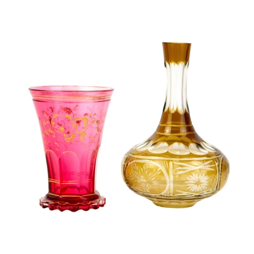 697 - A Bohemian amber flashed cut glass vase, early 20th century. Height 16.5cm; a Bohemian cranberry gla... 