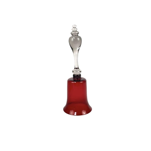 703 - A Victorian amber glass bell, Height 32.5cm, width 15cm, three Victorian cranberry glass bells and o... 