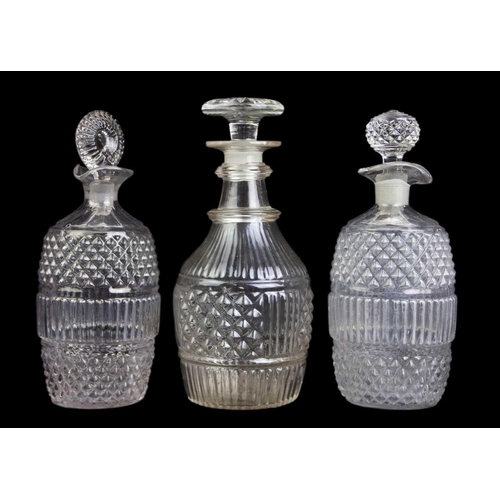 704 - Six blown glass decanters, probably Irish, circa 1820. Largest height 23cm. (6) Slight staining to t... 