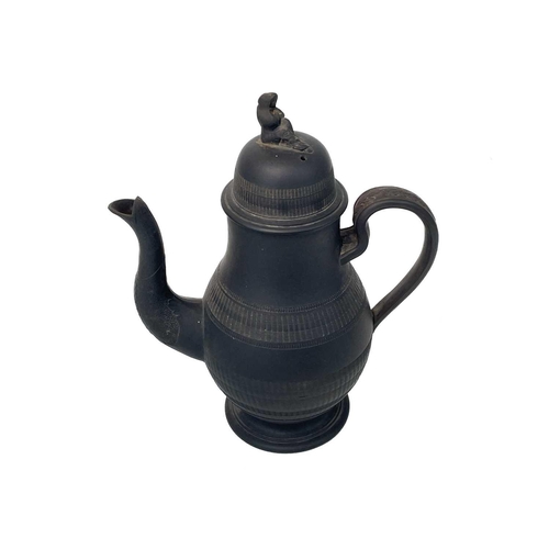 720 - A black basalt baluster coffee pot and cover. Circa 1800, possibly Elijah Mayer, with widow knop, an... 