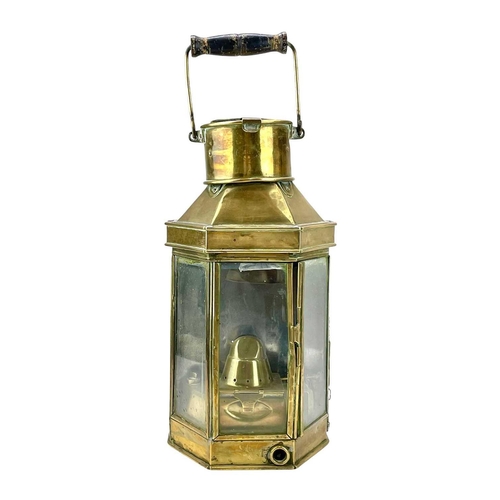 73 - A pair of brass bulkhead oil lamps by Bulpitt & Sons. Height 40cm. (2)