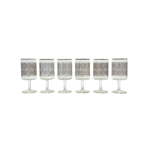 752 - A bespoke Murano glass part table service. Circa 1967, with engraved gilt heightened floral and foli... 