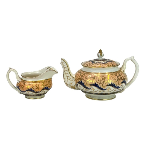 756 - An English porcelain tea and coffee set. Circa 1840, with salmon pink, blue and gilt decoration, com... 