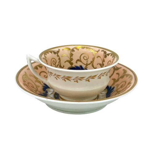 756 - An English porcelain tea and coffee set. Circa 1840, with salmon pink, blue and gilt decoration, com... 