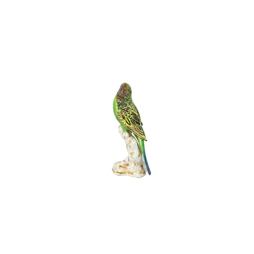 757 - A Royal Worcester figure of a budgerigar. With yellow, green and blue plumage, printed mark in puce,... 