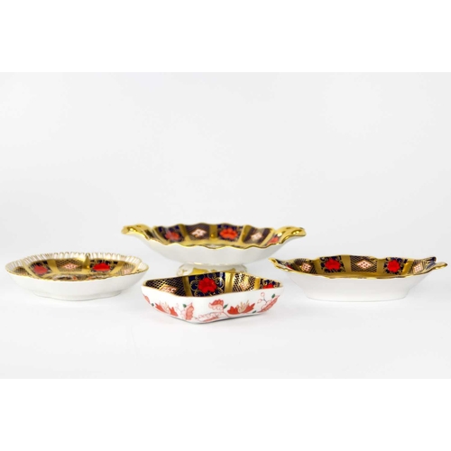 766 - Three Royal Crown Derby porcelain trinket dishes. Pattern number 1128; together with a twin handled ... 