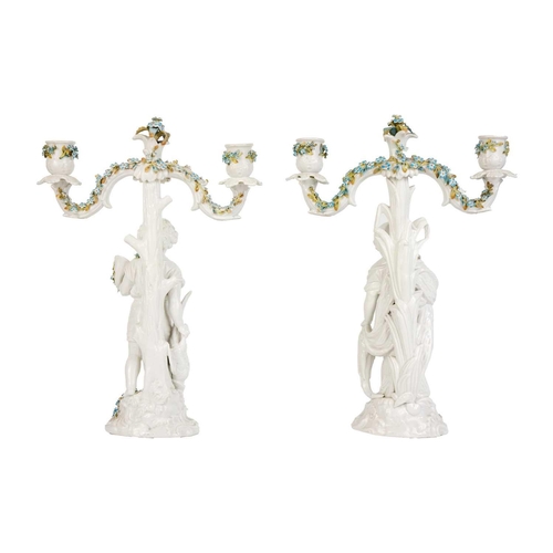 771 - A pair of German porcelain figural candelabra, circa 1900. Height 34cm, width 24cm. (2)