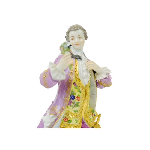 784 - A Meissen figure of a Gallant with a sword.. Late 19th century, in 18th century costume, height 20cm... 