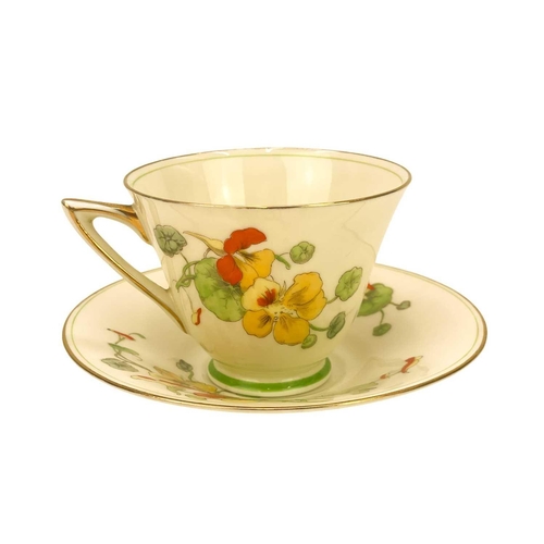 787 - A Royal Doulton Art Deco Nasturtium pattern part tea set. Impressed 1933 date code, comprising 12 sa... 