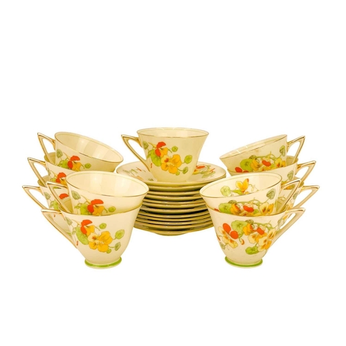 787 - A Royal Doulton Art Deco Nasturtium pattern part tea set. Impressed 1933 date code, comprising 12 sa... 