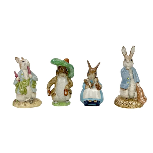 794 - A collection of 19 Beswick and Royal Albert Beatrix Potter figures. (19).