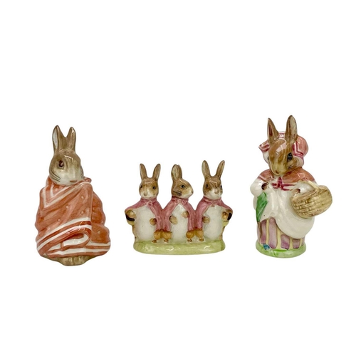 794 - A collection of 19 Beswick and Royal Albert Beatrix Potter figures. (19).