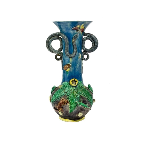 795 - A Portugese Palissy style vase. Circa 1900, with curled snake handles and applied moulded foliage, l... 