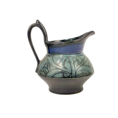 799 - A Celtic pottery part coffee set. A similar bowl, a blue ground jug, a vase, painted with a phoenix,... 