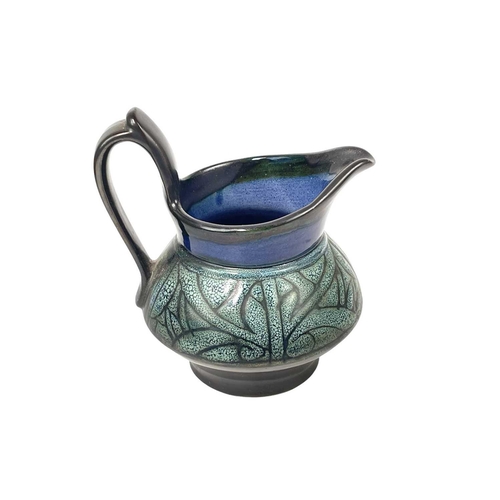 799 - A Celtic pottery part coffee set. A similar bowl, a blue ground jug, a vase, painted with a phoenix,... 