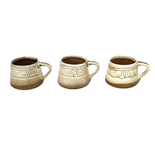 799 - A Celtic pottery part coffee set. A similar bowl, a blue ground jug, a vase, painted with a phoenix,... 