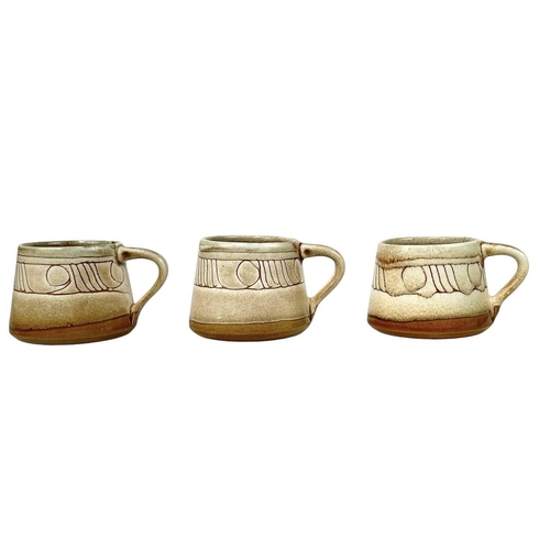 799 - A Celtic pottery part coffee set. A similar bowl, a blue ground jug, a vase, painted with a phoenix,... 