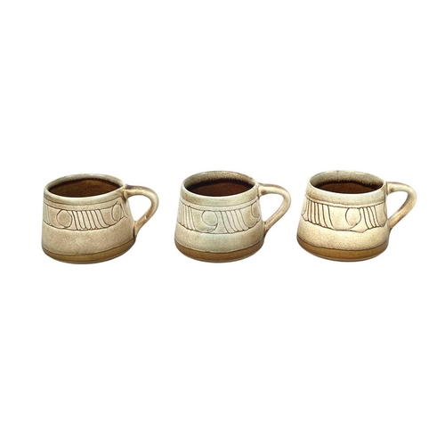 799 - A Celtic pottery part coffee set. A similar bowl, a blue ground jug, a vase, painted with a phoenix,... 