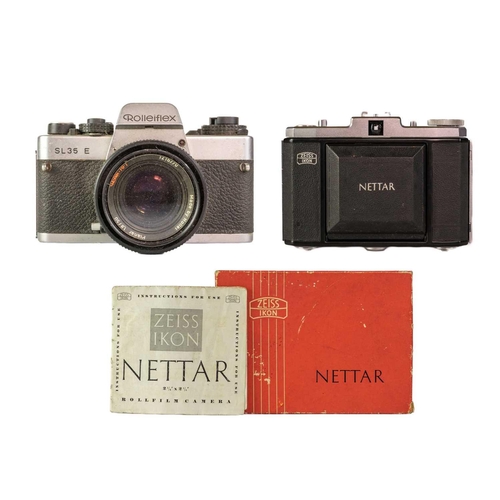 80 - A Rolleiflex SL35 E camera. Fitted with a Rollei-HFT Planar 1,8/50 lens together with a Zeiss Ikon N... 