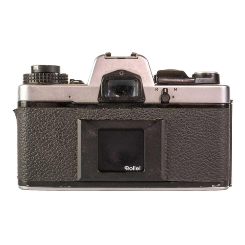 80 - A Rolleiflex SL35 E camera. Fitted with a Rollei-HFT Planar 1,8/50 lens together with a Zeiss Ikon N... 