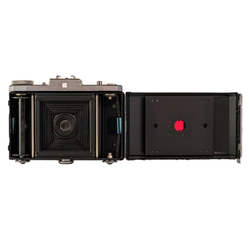 80 - A Rolleiflex SL35 E camera. Fitted with a Rollei-HFT Planar 1,8/50 lens together with a Zeiss Ikon N... 