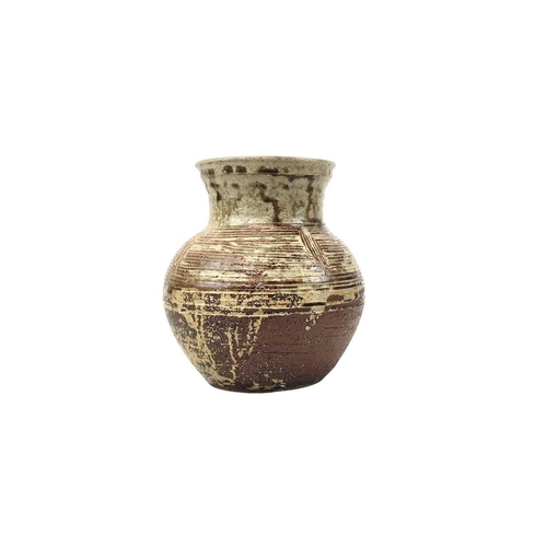 800 - Trevor Corser for Leach pottery. A vase, with a ribbed design, impressed seal marks, height 18cm.