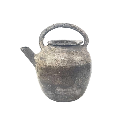 801 - Two studio pottery teapots and covers. One inscribed Lecomte henton?, with a bamboo handle, the othe... 