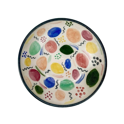 803 - Jonathan Hancock, St Just, a large colourful shallow bowl. Polychrome decorated, diameter 45cm, unma... 