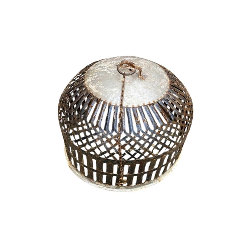 806 - An Indian metal domed animal cage. With lattice design, diameter 67cm.