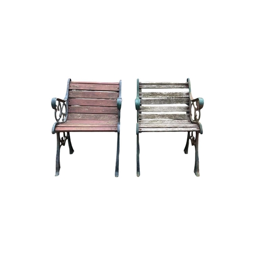 809 - A pair of cast iron garden chairs. Height 78cm width 56cm depth 64cm.