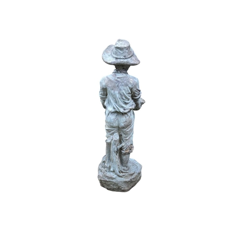 812 - A resin bird bath figure of a boy holding a lotus leaf. Height 56cm