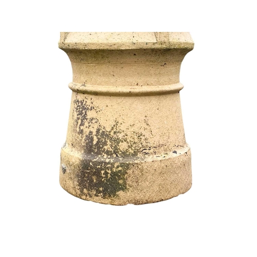 822 - A terracotta chimney pot. Height 79cm together with another smaller terracotta chimney pot. (2)