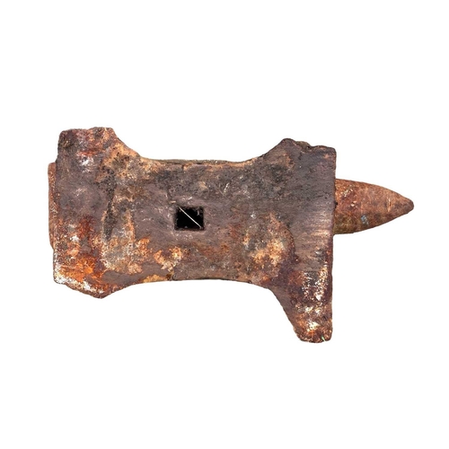 823 - A small cast iron blacksmith's anvil. Height 21cm.