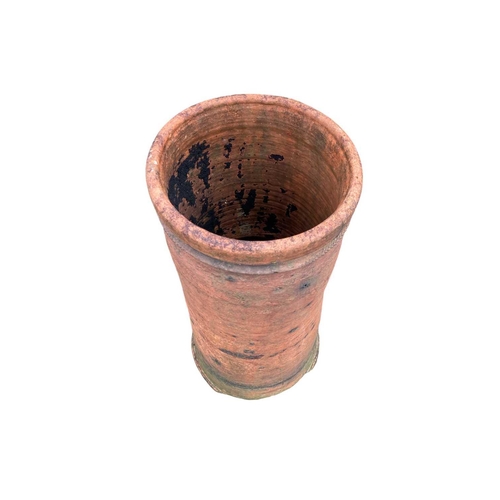 827 - An early to mid 18th century terracotta chimney pot. With banded repeat impressed Union decoration o... 