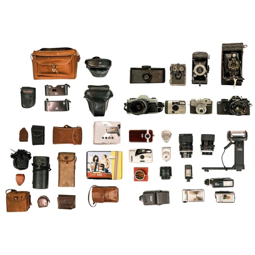 88 - A collection of cameras and accessories. Including a Nikon EM, a Minolta X-300, a Yashica TLR roll f... 