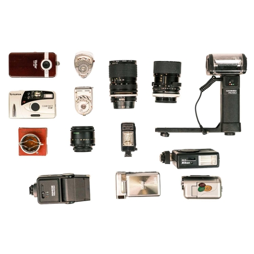 88 - A collection of cameras and accessories. Including a Nikon EM, a Minolta X-300, a Yashica TLR roll f... 