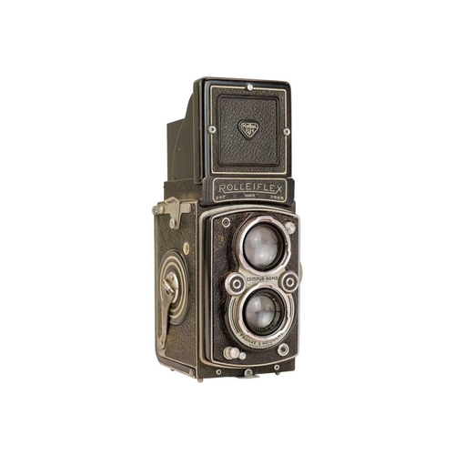 92 - A Rollieflex Compur-Rapid twin reflex camera. No 1063576, with fitted leather case.