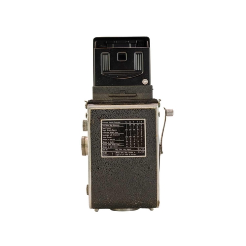 92 - A Rollieflex Compur-Rapid twin reflex camera. No 1063576, with fitted leather case.